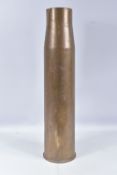 A LARGE 70cm TALL BRASS SHELL WITH MARKINGS TO THE BASE, we are unable to ascertain the exact age of
