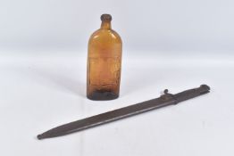 A WWI ERA GERMAN BUTCHER BAYONET AND A BROWN MEDICINE BOTTLE, the bayonet is clearly named Anker-