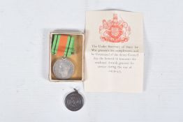 A WWII DEFENCE MEDAL IN ITS BOX OF ISSUE AND A ROYAL LIFE SAVING SOCIETY MEDAL, the Defence medal