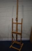 A DALER-ROWNEY BEECH ARTIST STUDIO EASEL, with a height adjustable lever
