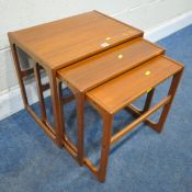A MID CENTURY TEAK NEST OF THREE TABLES, signed to underside reading Gelsted Denmark, largest