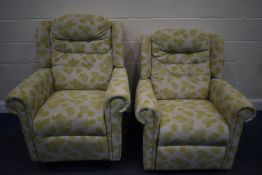 A PAIR OF HSL GREEN FLORAL UPHOLSTERED MANUAL RECLINING ARMCHAIRS, one chair raised on stilts,