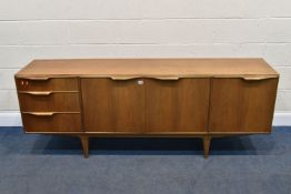 MCINTOSH OF KIRKCALDY, SCOTLAND, A TEAK SIDEBOARD, three graduated drawers the top drawer with