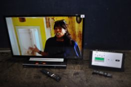 A TOSHIBA 32L3753DB 32in SMART TV with remote, a Toshiba DVD player and a Roberts DAB/CD player with