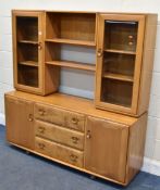 LUCIAN ERCOLINI, AN ERCOL WINDSOR ELM AND BEECH SIDEBOARD / DISPLAY CABINET, model 455d, the top