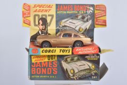 A BOXED CORGI TOYS JAMES BONDS 007 ASTON MARTIN DB5 MODEL VEHICLE, numbered 261, gold body with grey
