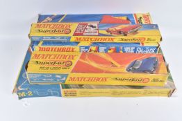 A BOXED MATCHBOX MOTORISED MOTORWAY SET, No.M-2, contents not checked but appears largely