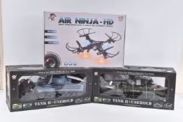 TWO BOXED YH TOYS 1:20 SCALE TANK HOUSEHOLD RC SIMULATING BATTLE TANKS, the first a Snow Leopard