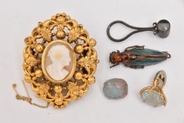 A SMALL BAG OF JEWELLERY, to include a gold plated cameo set brooch, carved shell cameo depicting