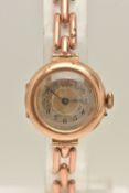 A LADIES 9CT GOLD WRISTWATCH, hand wound movement, round dial, Arabic numerals, yellow gold case,