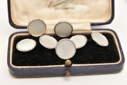 A CASED SET OF WHITE METAL DRESS STUDS AND CUFFLINKS, to include a pair of chain link cufflinks,