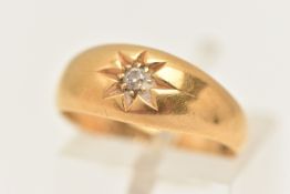 AN 18CT GOLD DIAMOND RING, star set with a small round brilliant cut diamond, to the polished