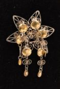 A NORWEGIAN WHITE AND YELLOW METAL WEDDING BROOCH, a six pointed open work filigree star brooch