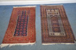 A RED AND BLUE GROUND AFGHAN RUG, with repeating geometric patterns, surrounded by a multi-strap