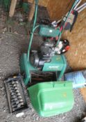 A QUALCAST CLASSIC PETROL 35s CYLINDER LAWN MOWER, with grass box and scarifier attachment,