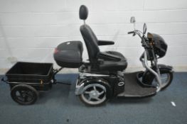 AN EASY RIDER THREE WHEELED MOBILITY SCOOTER, with removable trailer box and tekbox, serial number