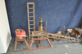 A COLLECTION OF AUTOMOTIVE TOOLS, including a pair of lifting ramps with screw thread elevation