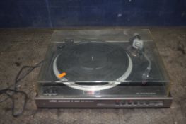 A METZ TX 4963 QUARTZ TURNTABLE. with a smoked plexi glass lid, an ALS Ersatz tonearm (PAT pass