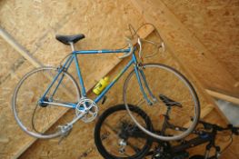 A FRANCESCO MOSER BICYCLE, with a 23 inch frame, Shimano breaks and gears, condition report: chain