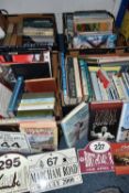 FOUR BOXES OF BOOKS to include motoring interest, biographies, European guide books, vintage