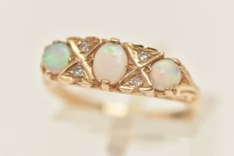 A 9CT GOLD OPAL AND DIAMOND RING, one oval cut and two circular cut white opal cabochons, with