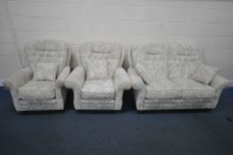 A BEIGE AND FOLIATE THREE PIECE LOUNGE SUITE, comprising a two seater sofa, length 152cm x depth