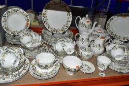 A WEDGWOOD 'BEACONSFIELD' SERVICE to include two lidded tureens, two meat plates, a sauce boat and