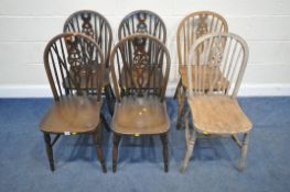 A SET OF FOUR OAK WHEEL BACK CHAIRS, along with two similar elm chairs, condition report: all with