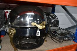 A GROUP OF CATERING SERVING DISHES to include a stainless steel lidded chafing dish with brass