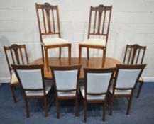 A LATE 20TH CENTURY EXTENDING DINING TABLE, with a single fold out leaf, extended length 193cm x