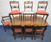 AN EDWARDIAN MAHOGANY WIND OUT DINING TABLE, with one additional leaf, raised on cabriole legs
