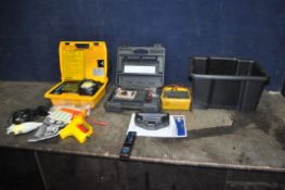 A TRAY CONTAINING ELECTRICAL TESTING TOOLS including a Megger MIT220 meter, a Martindale PAT