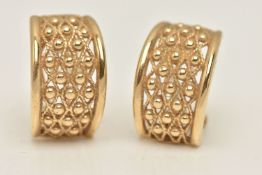 A PAIR OF YELLOW METAL EARRINGS, a pair of wide half hoop design earrings, fitted with post and