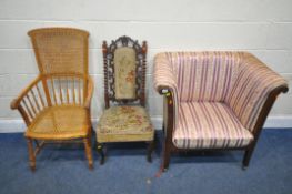 A DEEP ARMCHAIR, with stripped and foliate upholstery, raised on castors, width 93cm x depth 56cm