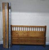 AN IKEA PINE 5FT BEDSTEAD, with side rails, slats, central support and bolts, condition report: some