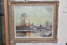 JOHN TRICKETT (BRITISH 1952) A SUNSET WINTER LANDSCAPE, the setting sun is reflected in on water