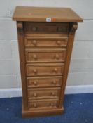 A MODERN PINE CHEST OF SEVEN DRAWERS, width 50cm x depth 37cm x height 118cm, condition report: