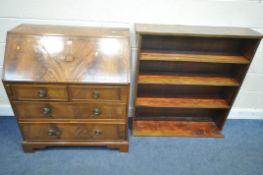 AN EARLY 20TH CENTURY MAHOGANY BUREAU, the fall front door enclosing a fitted interior, above two