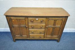 AN ERCOL STYLE SIDEBOARD, fitted with four drawers, flanked by two cupboard doors, width 147cm x