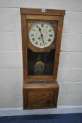 THE GLEDHILL-BROOK TIME RECORDERS LIMITED, an early 20th century oak cased clocking in machine,