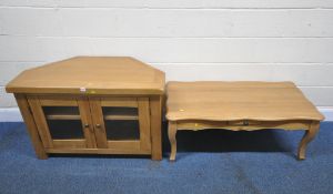 A MODERN LIGHT OAK TV CABINET, with double glazed doors, width 106cm x depth 56cm x height 69cm,