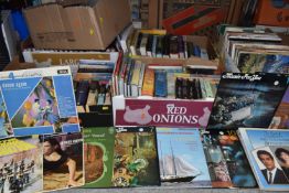 SEVEN BOXES OF BOOKS, RECORDS, AND DVDS to include a large quantity of historical fiction novels