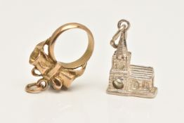 TWO STANHOPE CHARMS, the first a yellow gold marriage licence stanhope, with a passage visible,