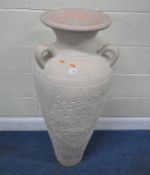 A LARGE TERRACOTTA VASE, with three handles, and repeating geometric patterns, height 112cm,
