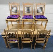 A HARDWOOD RECTANGULAR DINING TABLE, raised on turned legs, length 175cm x depth 90cm x height 76cm,