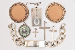AN ASSORTMENT OF SILVER AND WHITEMETAL JEWELLERY, to include a silver ingot pendant with shoe
