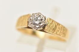 A SINGLE STONE DIAMOND RING, a round brilliant cut diamond, approximate total carat weight 0.15ct,