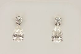 A PAIR OF CERTIFIED PEAR CUT DIAMOND STUD EARRINGS, both with International Gemological Institute (