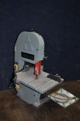 A DELTA BANDSAW with parallel and mitre guides total height 67cm (PAT pass and working)