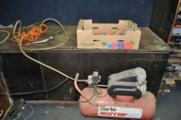A CLARKE WARRIOR AIR COMPRESSOR and a tray containing pneumatic tools such as tyre inflaters,